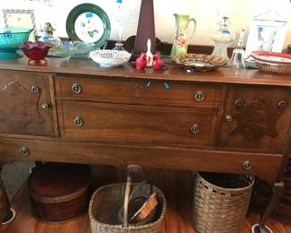 Beautiful solid wood credenza. Vintage bowls and Carnival glass. Lanterns. Vintage Baskets. Stained Glass Tiffany like lamp