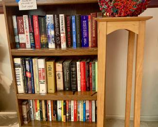 Book shelf and books. Wood plant stand