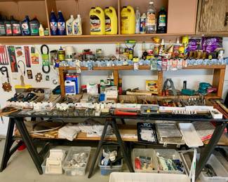 Garage tools, oils for cars, painting tools and window cleaning tools.