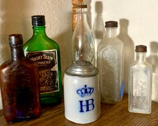 Vintage bottles and salt glazed stein