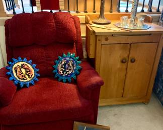 Red Recliner. Vintage butcher block cabinet. Tiffany Style Stained Glass Lamp