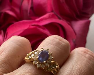 81	$200 	14kt carat gold tested ring with amethyst &
		moissanite size 5 - 5.35 gr  -
