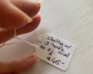 78	$46 	Sterling ring 3 topaz sz 6.5 
