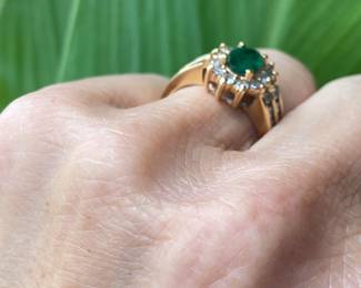 82	$250 	14kt carat gold tested ring with emerald stone &
		moissanites size 5 - 5.12 gr
