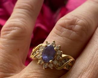 81	$200 	14kt carat gold tested ring with amethyst &
		moissanite size 5 - 5.35 gr  -
