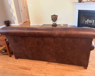 12	$425 	Thomasville Leather Sofa - Brown. 
		  75W X 23D X 36H
