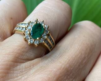 82	$250 	14kt carat gold tested ring with emerald stone &
		moissanites size 5 - 5.12 gr
