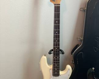 42	$350 	Fender Precision Bass White four string Guitar 
		  with case E813043
