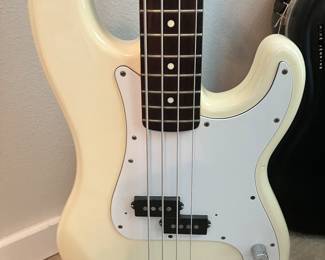 42	$350 	Fender Precision Bass White four string Guitar 
		  with case E813043
