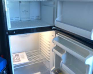 58	$180 	Whirlpool Top Mount Refrigerator
		  24W X 22D X 59H
