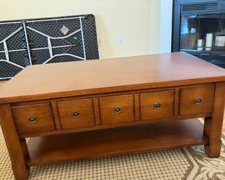 #14	$150 	Thomasville Rectangle Coffee Table with 6 Drawers
		  42W X 22D X 18H
