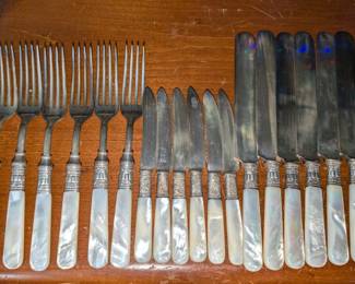 MOTHER OF PEARL HANDLED CUTLERY WITH STERLING HANDLE WRAPS