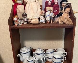 Vintage children's dishes and dolls