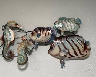 Metal fish sculpture.