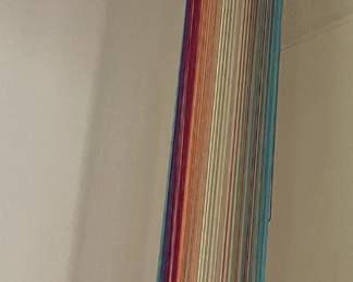 Vintage rainbow string "wind sock."