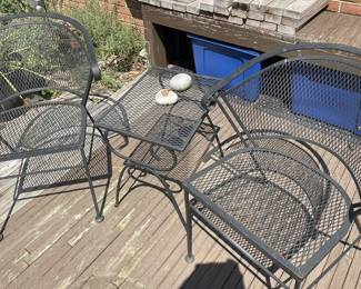 Wrought iron chairs and table.