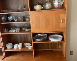 Danish teak wall unit with glassware and china.