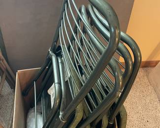 Folding metal chairs with matching card table.