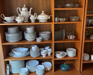 Danish teak wall unit with glassware and china.