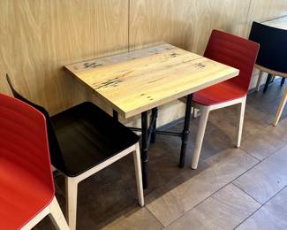 Small wood tables with iron bases x 4 $250 each, andreu world black and red   armless chairs $200 each