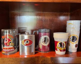 Assorted Redskins cups and flask