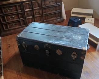 Trunk with tray/ closet storage.