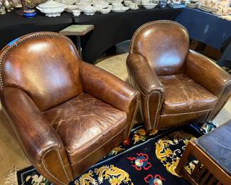 Two Leather Arm Chairs