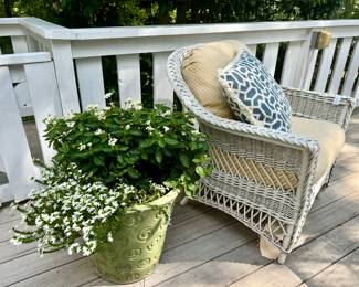 wicker chairs, tables and planters