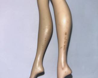 Some discoloration on Barbie's Legs due due to Medal Prong From Being Stored for 65 Years