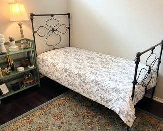 100+ year-old custom iron bed from France
