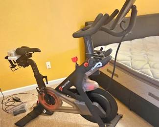 1 of 9 Pictures - Peloton Systems Exercise Bike! Includes 2 Sets Of Dumbells, Headphones, Size 41 & 39 Peloton Biking Shoes