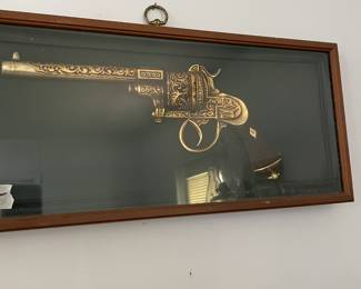 Framed model gun