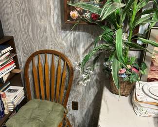Chair, roomba, faux plants