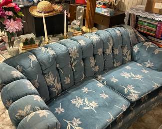 Vintage curved blue floral sofa. Camelback. 