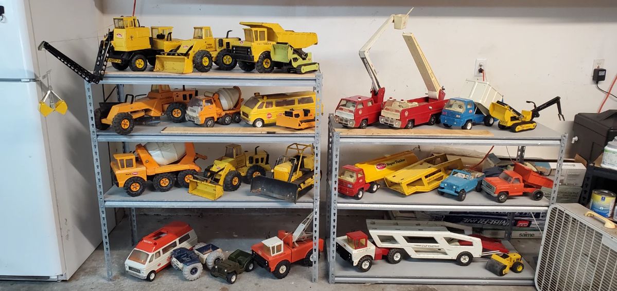 Original TONKA trucks and tractors - large and small. Original paint/condition.