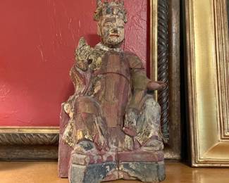 Antique Chinese wood carving of the Emperor reminiscent of the Ching Dynasty.