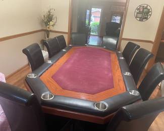
Custom made regulation poker table with 10 chairs.  $1,000. If you would like to make an appoint to see, please call to make arrangements. 