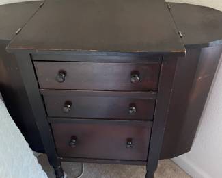 Antique sewing cabinet