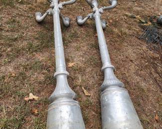 Pair of lamp posts -have large white globes that go with them