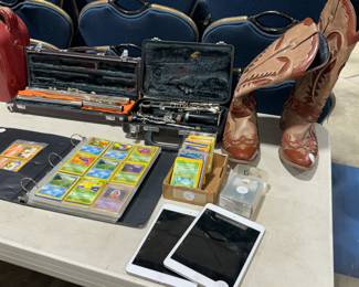 Flute, Clarinet, Pokemon Cards, Tablets and Boots Orlando Estate Auction