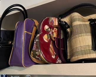 The purse with black tassel is sold.