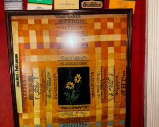 Silk cigar band framed quilt