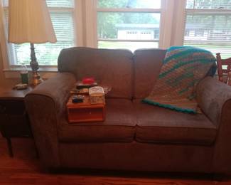 Loveseat is gray