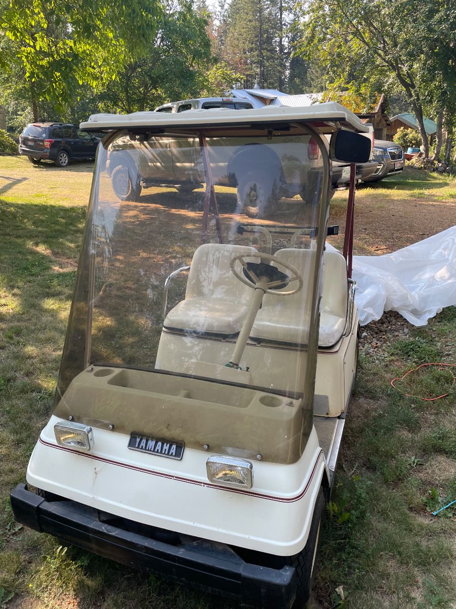Item #01 Yamaha Golf Cart with new charger and new batteries