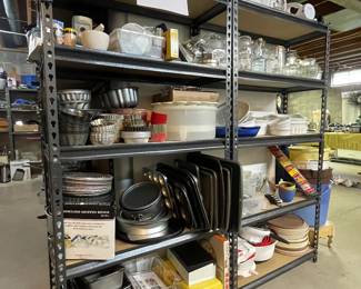 Large collection of baking pans and dishes