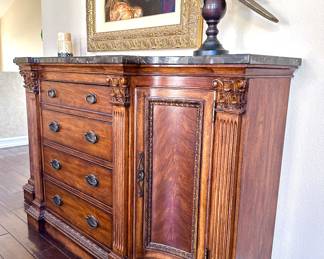 Vintage  serving buffet and silver storage. 4 drawers and scalloped side doors with brown marble top 