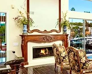 Vintage Solid Wood Bau Design Mirror and Custom ornate solid wood mantel 