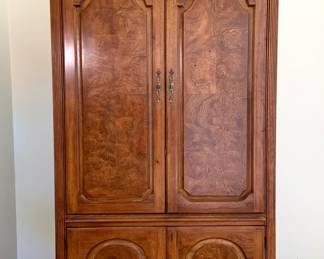 Thomasville entertainment cabinet 24inches deep. Wired for electrical