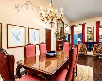 Vintage Bau Design formal dining table, 6 side chairs and 2 additional arm chairs, table has 2 leafs and thick felt protectors. Brass chandelier. 6 window panels in matching fabric sold in sets of two or 3 pairs