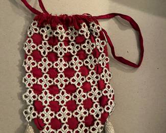 MCM drawstring purse worn crocheted beads
